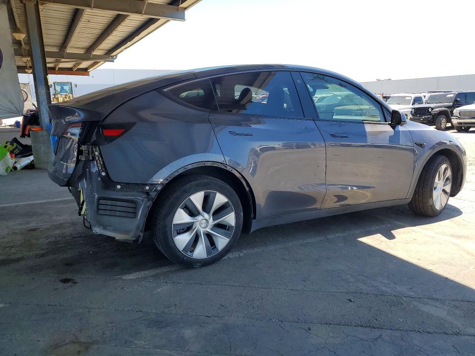 2023 Tesla Model y VIN 7SAYGDEE2PF625377 COPART salvage auction — REAR END, Ca - Salvage Certificate, sold $7,700 on 2026-07-07 (photo 3)