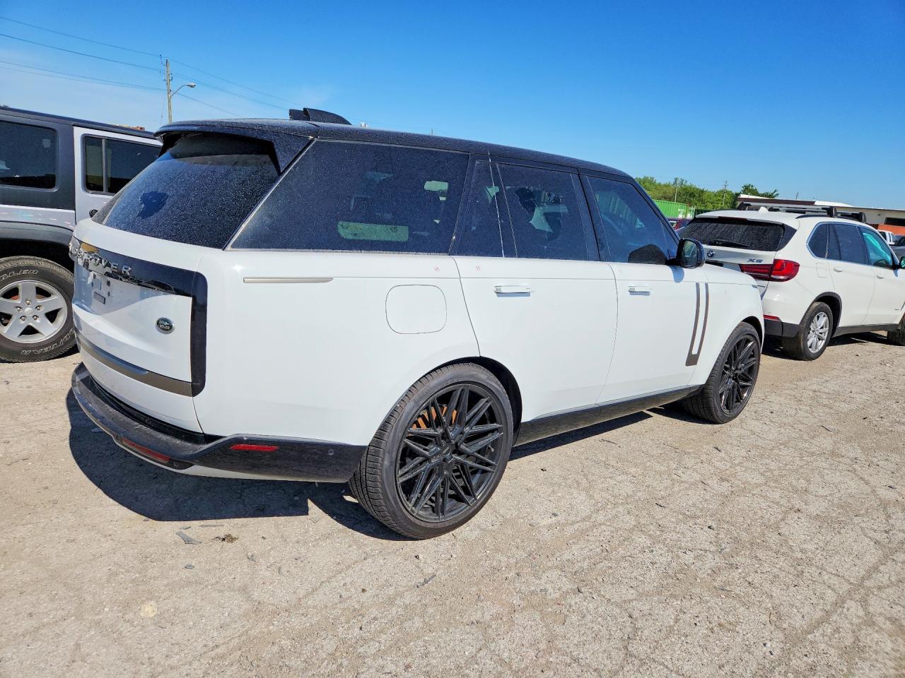 2023 Land Rover Range Rover VIN SALKP9FUXPA028453 COPART salvage auction — Side, IN - CERT OF TITLE-SALVAGE TITLE, sold $51,500 on 2026-07-07 (photo 3)