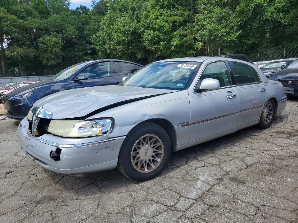 2001 Lincoln TOWN CAR VIN 1LNHM82WX1Y728687 COPART salvage auction — SIDE, GA - CERT OF TITLE-SALVAGE, sold $425 on 2026-07-31 (photo 1)