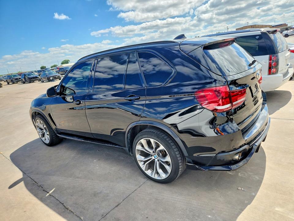 2015 BMW VIN 5UXKR0C58F0P11460 COPART salvage auction — NORMAL WEAR, Tx - Certificate Of Title, sold $4,250 on 2026-07-09 (photo 2)