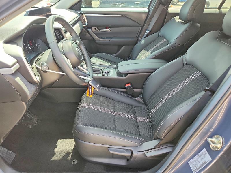 2024 Mazda Cx-50 VIN 7MMVABAM9RN236842 COPART salvage auction — WATER/FLOOD, TX - SALVAGE TITLE-FLOOD DAMAGE, sold $8,300 on 2026-08-27 (photo 7)