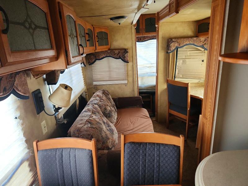 2008 Keystone Camper VIN 4YDF3402684701444 COPART salvage auction — WATER/FLOOD, FL - CERT OF TITLE-SLVG REBLD FLOOD, sold $925 on 2026-09-11 (photo 6)
