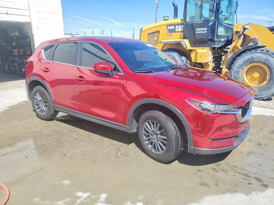 2020 Mazda Cx-5 VIN JM3KFBCM9L0786751 COPART salvage auction — NORMAL WEAR, Ut - Certificate Of Title, sold $10,200 on 2026-07-07 (photo 4)