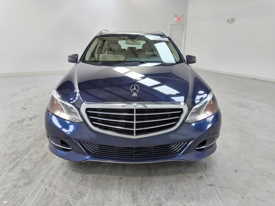 2014 Mercedes-benz E-class VIN WDDHH8JB8EB025501 COPART salvage auction — NORMAL WEAR, Wv - Certificate Of Title, sold $2,900 on 2026-07-09 (photo 5)