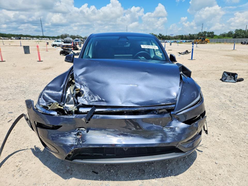 2026 Tesla Model y VIN 7SAYGDED7TA419311 COPART salvage auction — FRONT END, TX - SALVAGE VEHICLE TITLE (P), sold $14,300 on 2026-07-23 (photo 5)