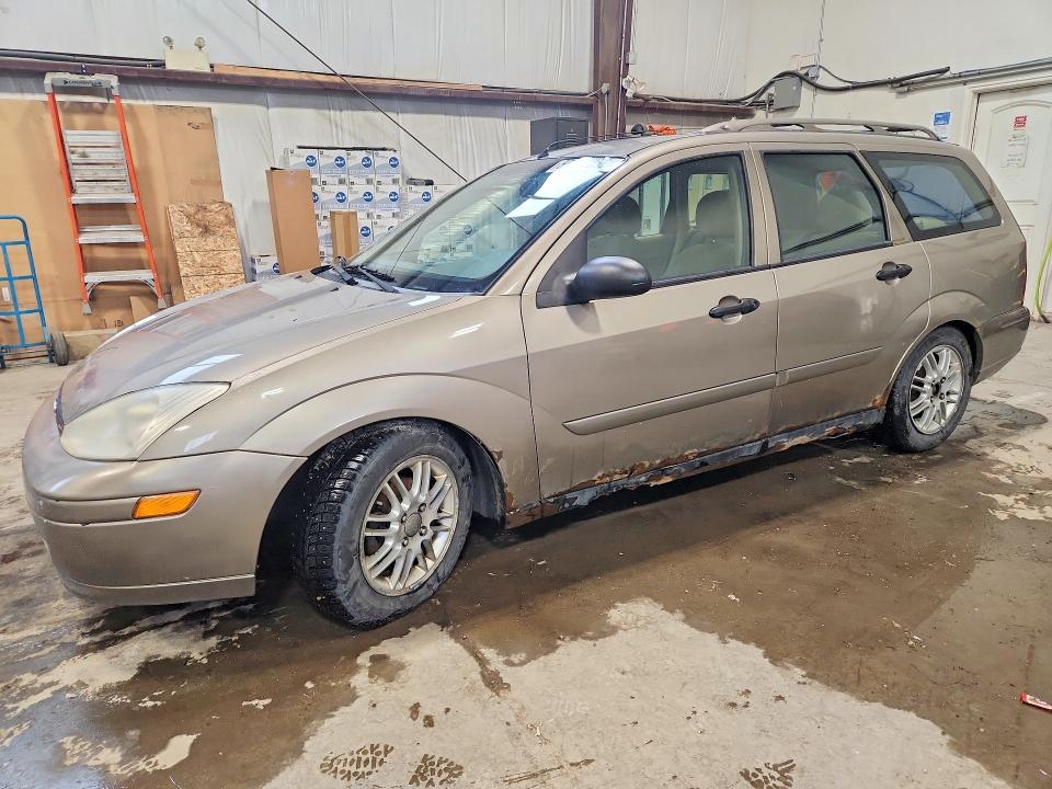 2003 Ford Focus VIN 1FAFP36313W310058 — COPART salvage auction photo