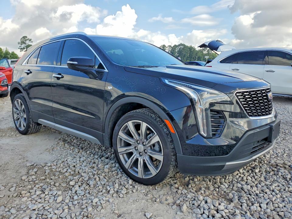 2023 Cadillac Xt4 VIN 1GYFZCR42PF153889 COPART salvage auction — HAIL, Tx - Certificate Of Title, sold $14,300 on 2026-07-10 (photo 4)