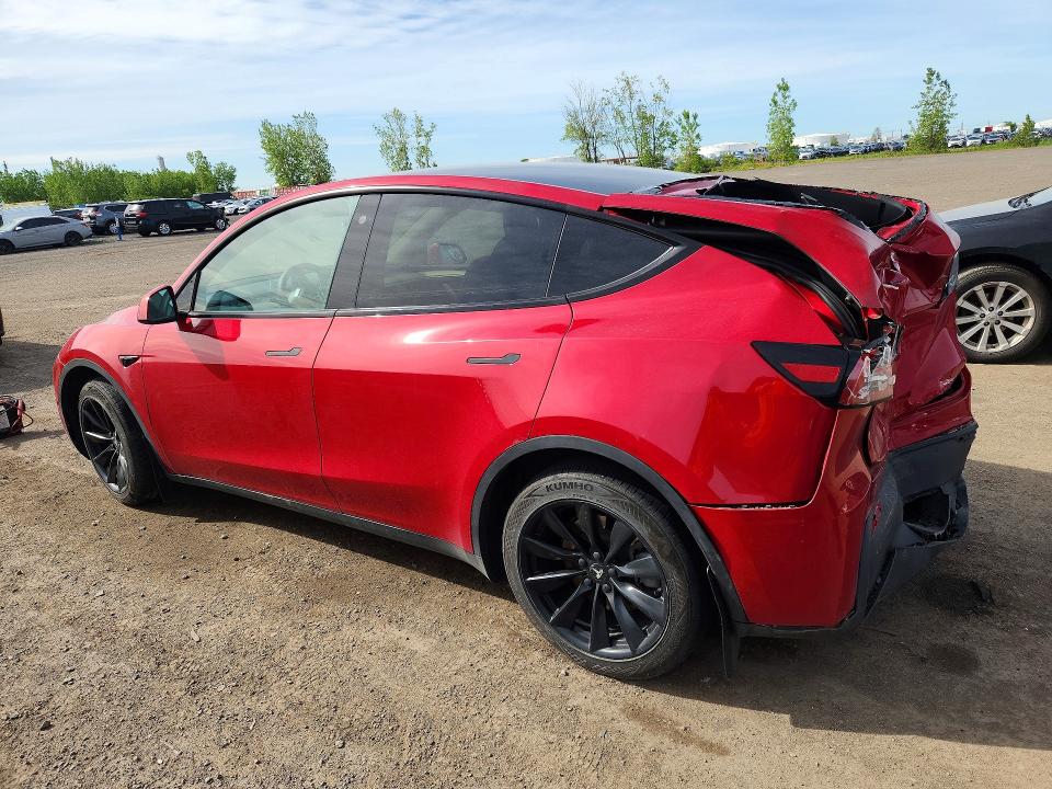 2023 Tesla Model y VIN LRWYGDFDXPC966569 COPART salvage auction — REAR END, Qc - Gravement Accidente, sold $7,600 on 2026-07-07 (photo 2)