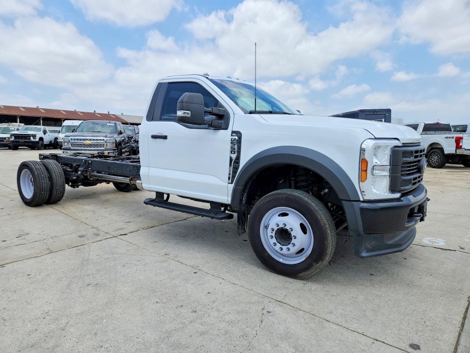 2024 Ford F550 VIN 1FDUF5GT9RDA09424 COPART salvage auction — MINOR DENT/SCRATCHES, Mi - Dis/Dlr/Exp Only Salvage Title, sold $26,750 on 2026-07-08 (photo 4)