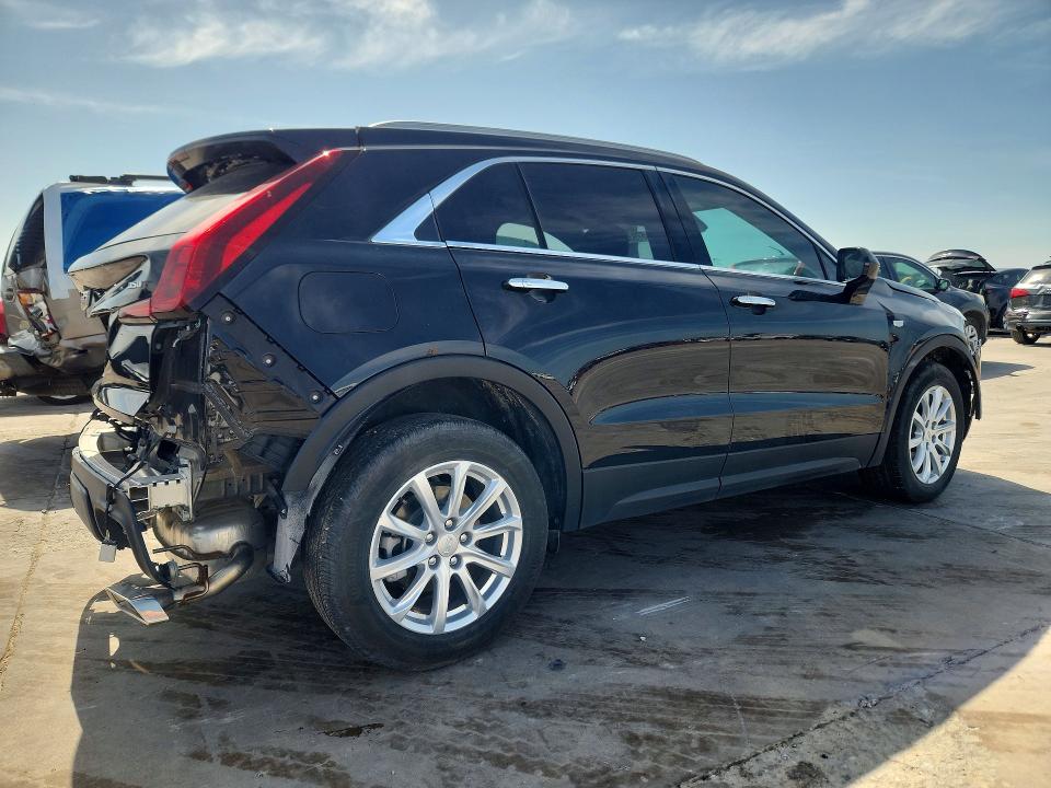 2023 Cadillac Xt4 VIN 1GYAZAR42PF102696 COPART salvage auction — REAR END, TX - SALVAGE VEHICLE TITLE, sold $8,700 on 2026-08-10 (photo 3)