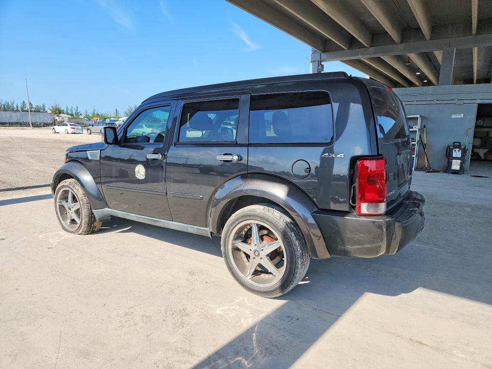 2011 Dodge VIN 1D4PU4GK4BW590627 COPART salvage auction — REAR END, FL - CERT OF TITLE SLVG REBUILDABLE, sold $350 on 2026-07-02 (photo 2)