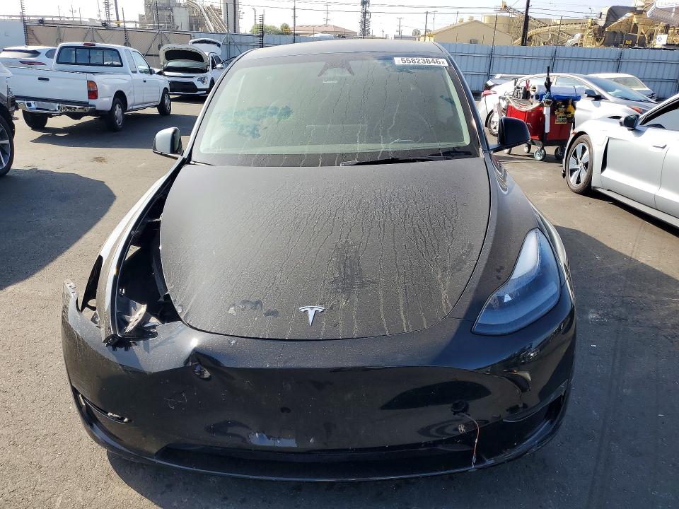 2024 Tesla Model y VIN 7SAYGDED9RF120883 COPART salvage auction — FRONT END, Ca - Salvage Certificate, sold $9,400 on 2026-07-06 (photo 5)