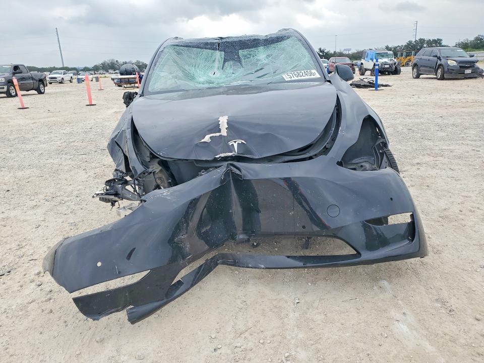 2021 Tesla Model y VIN 5YJYGDEE4MF067654 COPART salvage auction — ROLLOVER, TX - SALVAGE VEHICLE TITLE, sold $275 on 2026-07-23 (photo 5)