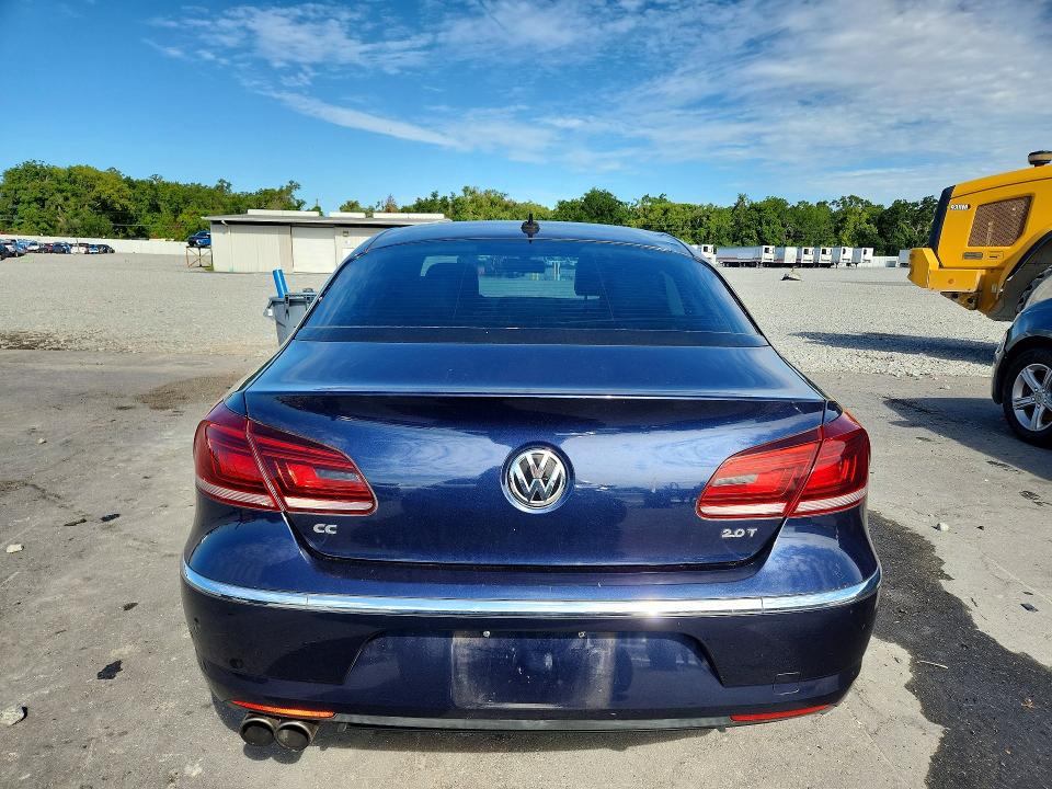2013 Volkswagen VIN WVWBP7AN9DE561975 COPART salvage auction — MINOR DENT/SCRATCHES, Fl - Cert Of Title Slvg Rebuildable, sold $925 on 2026-07-20 (photo 6)