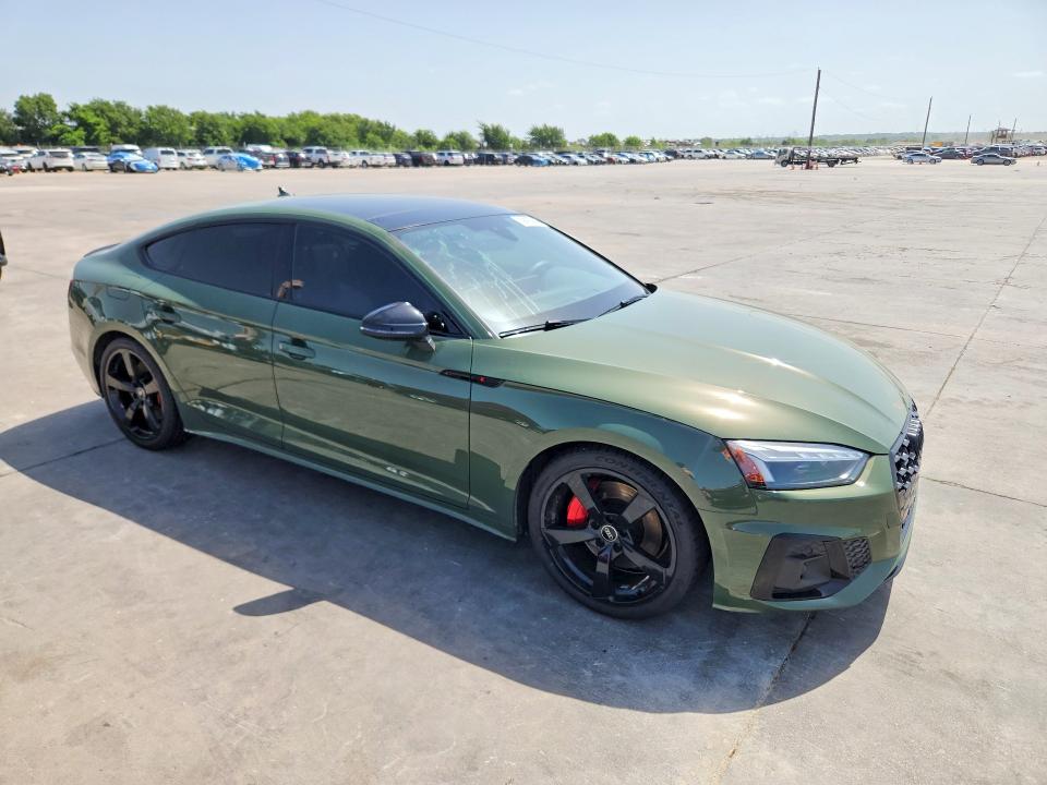 2023 Audi A5 VIN WAUFACF53PA030199 COPART salvage auction — WATER/FLOOD, TX - SALVAGE TITLE-FLOOD DAMAGE, sold $4,600 on 2026-07-30 (photo 4)
