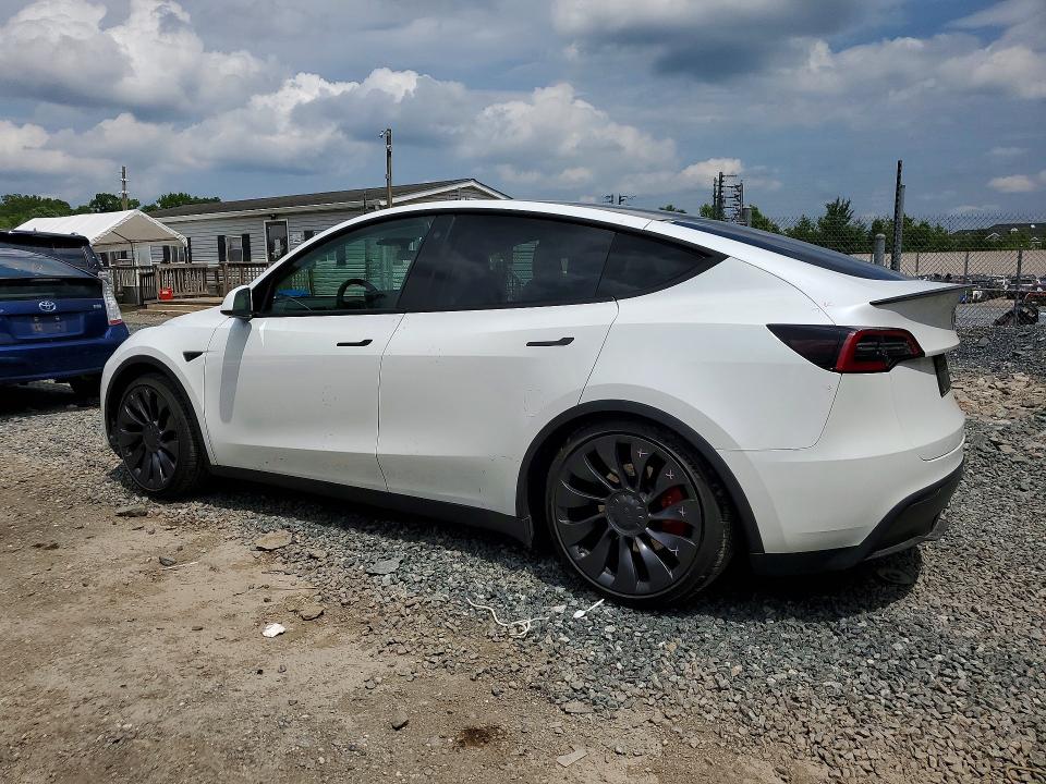 2023 Tesla Model y VIN 7SAYGDEF7PF788423 COPART salvage auction — REAR END, Salvage Title, sold $13,500 on 2026-07-23 (photo 2)