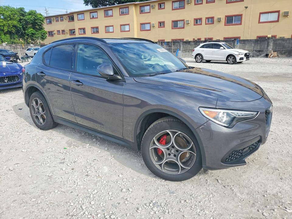 2023 Alfa romeo VIN ZASPAJAN3P7D59704 COPART salvage auction — SIDE, Fl - Certificate Of Destruction, sold $9,500 on 2026-07-25 (photo 4)