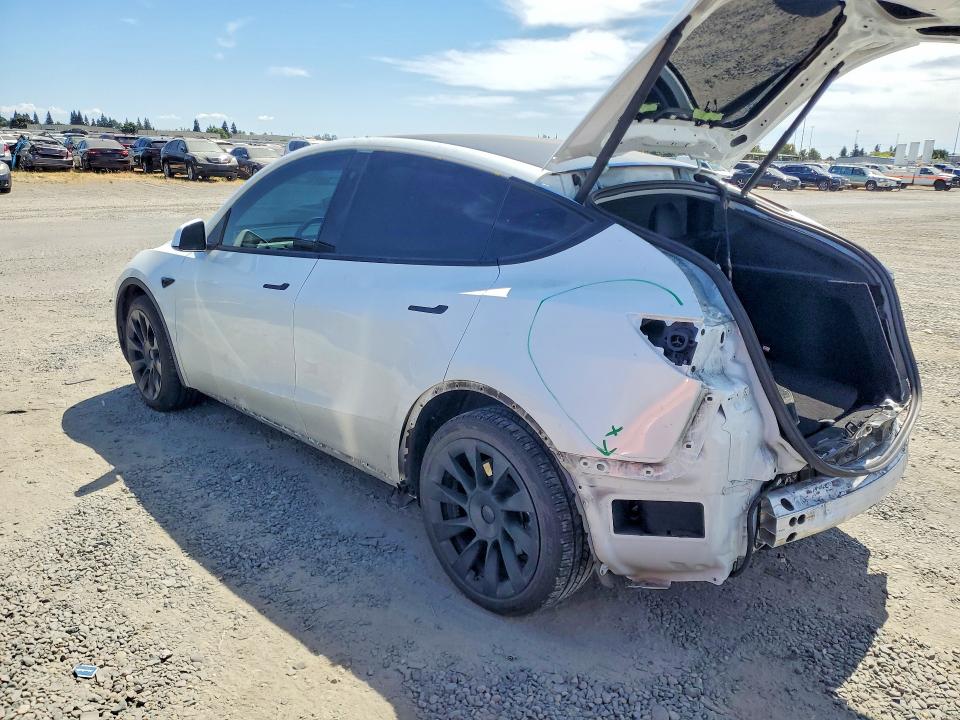 2023 Tesla Model y VIN 7SAYGDEE8PF690878 COPART salvage auction — REAR END, CA - SALVAGE CERTIFICATE, sold $10,700 on 2026-07-28 (photo 2)