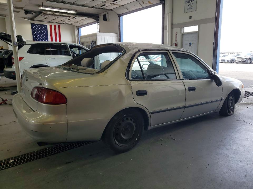 2000 Toyota Corolla VIN 1NXBR12E8YZ407044 COPART salvage auction — ROLLOVER, WA - BILL OF SALE, sold $275 on 2026-07-10 (photo 3)