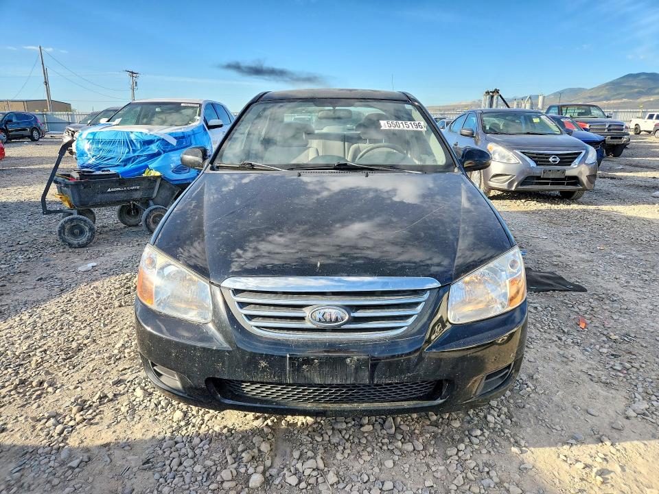 2009 Kia Spectra VIN KNAFE222395593193 COPART salvage auction — SIDE, Ut - Salvage Certificate, sold $700 on 2026-07-10 (photo 5)