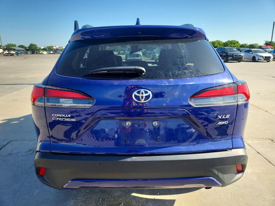 2022 Toyota Corolla cross VIN 7MUDAABG9NV024743 COPART salvage auction — WATER/FLOOD, TX - SALVAGE TITLE-FLOOD DAMAGE, sold $6,500 on 2026-07-03 (photo 6)