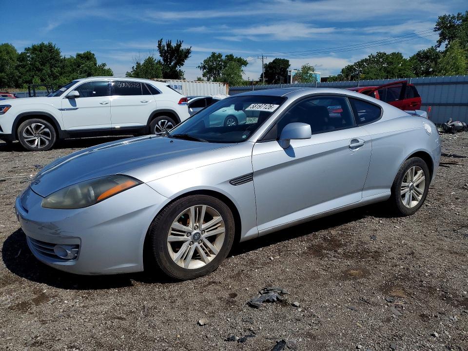 2007 Hyundai Tiburon VIN KMHHM66DX7U248100 COPART salvage auction — FRONT END, Il - Salvage Certificate, sold $325 on 2026-07-29 (photo 1)