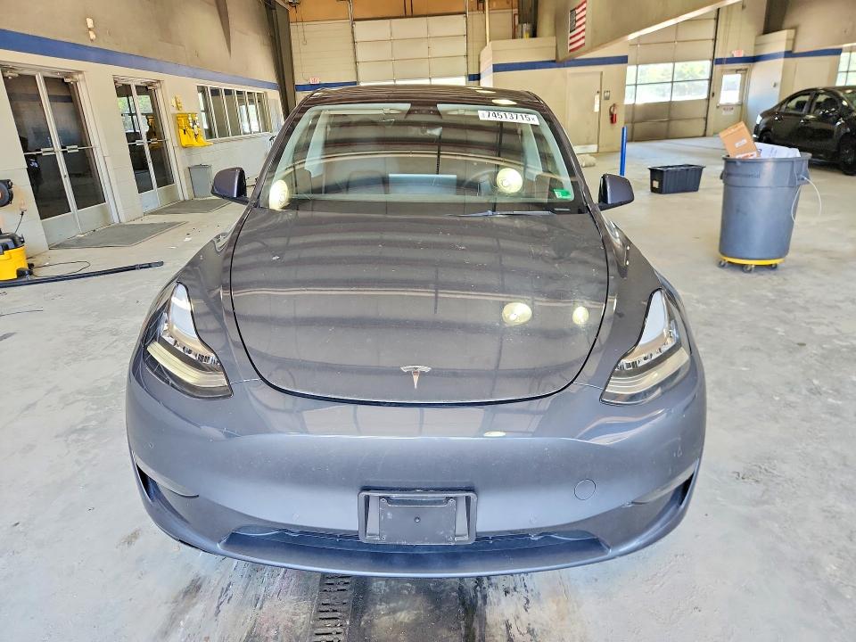 2022 Tesla Model y VIN 7SAYGDEE4NA020013 COPART salvage auction — UNDERCARRIAGE, Va - Cert Of Title - Salvage, sold $11,400 on 2026-07-17 (photo 5)