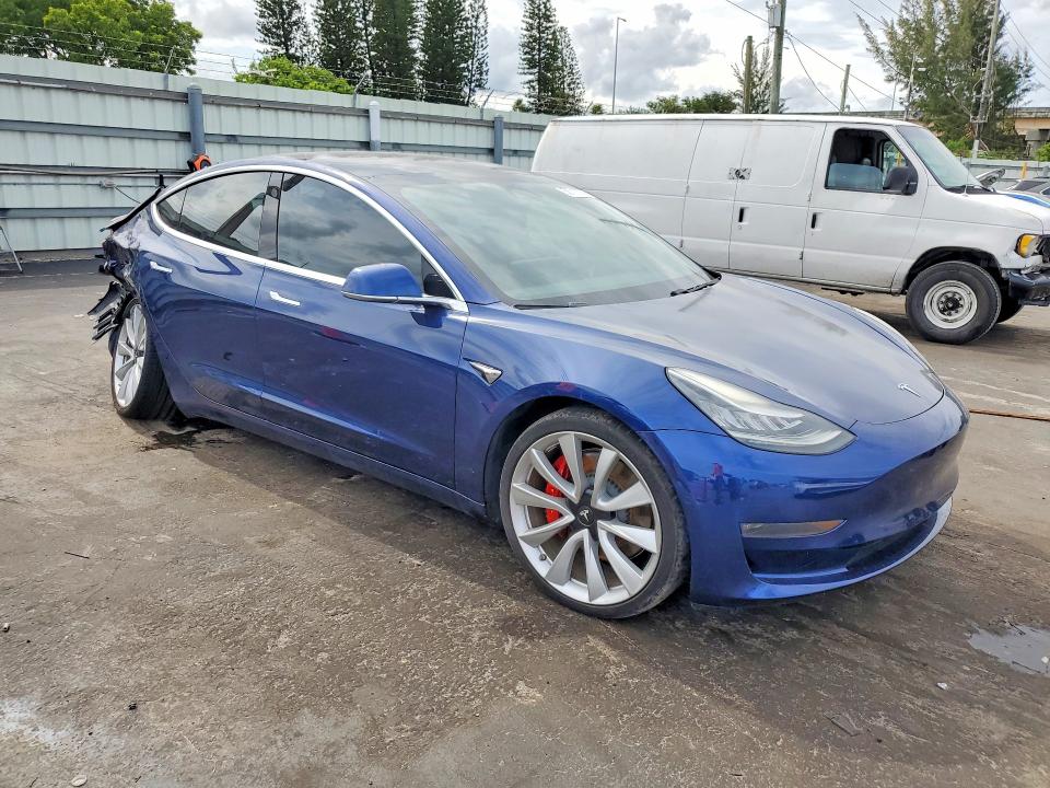 2019 Tesla Model 3 VIN 5YJ3E1EB8KF237774 COPART salvage auction — REAR END, Fl - Cert Of Title Slvg Rebuildable, sold $5,500 on 2026-07-08 (photo 4)