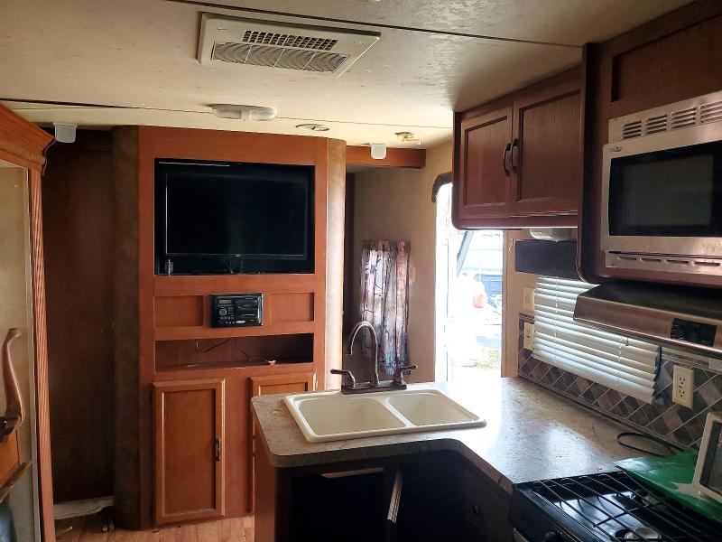 2014 Foresriver VIN 4X4TWDG24EA250962 COPART salvage auction — VANDALISM, TX - SALVAGE TITLE-FLOOD DAMAGE, sold $5,600 on 2026-07-17 (photo 5)