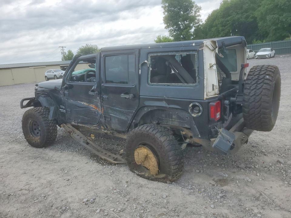 2011 Jeep Wrangler / VIN 1J4BA3H17BL610574 COPART salvage auction — ROLLOVER, Tn - Salvage Certificate, sold $1,000 on 2026-07-09 (photo 2)