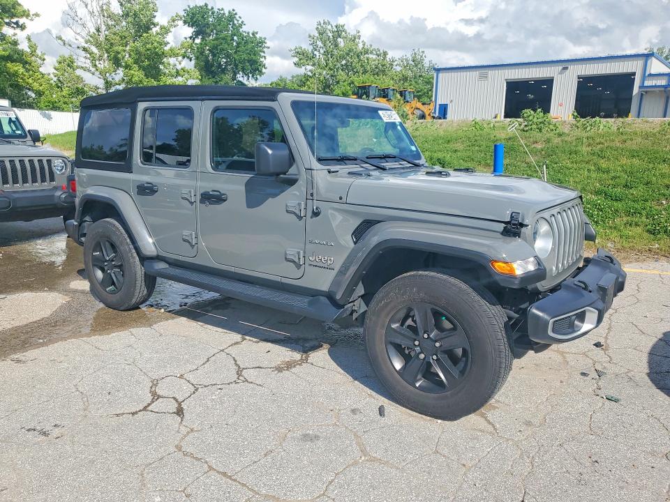 2023 Jeep Wrangler / VIN 1C4HJXEN0PW677098 COPART salvage auction — MINOR DENT/SCRATCHES, Mo - Certificate Of Title, sold $22,500 on 2026-07-02 (photo 4)