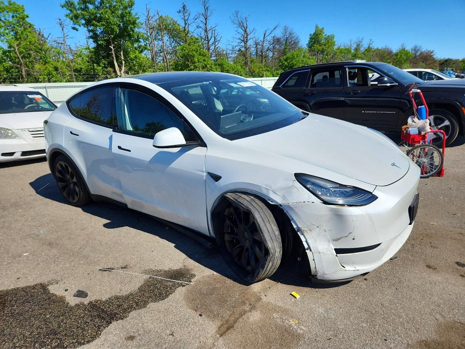 2023 Tesla Model y VIN 7SAYGDEE8PA078922 COPART salvage auction — FRONT END, Ny - Mv-907A Salvage Certificate, sold $11,900 on 2026-07-08 (photo 4)