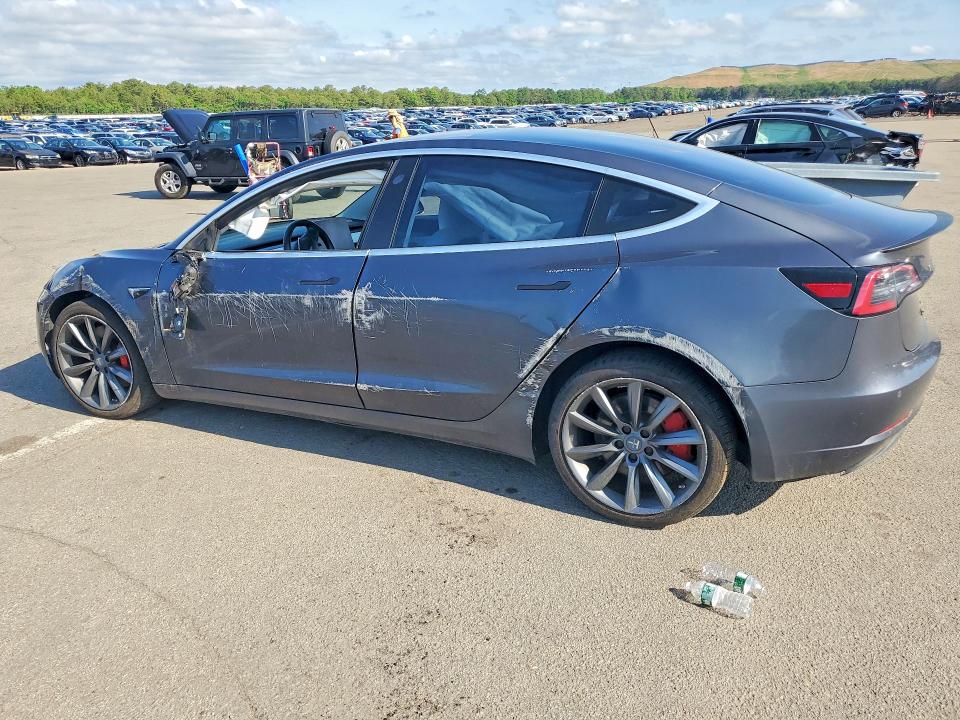 2018 Tesla Model 3 VIN 5YJ3E1EB8JF079385 COPART salvage auction — SIDE, Ny - Mv-907A Salvage Certificate, sold $6,100 on 2026-07-15 (photo 2)