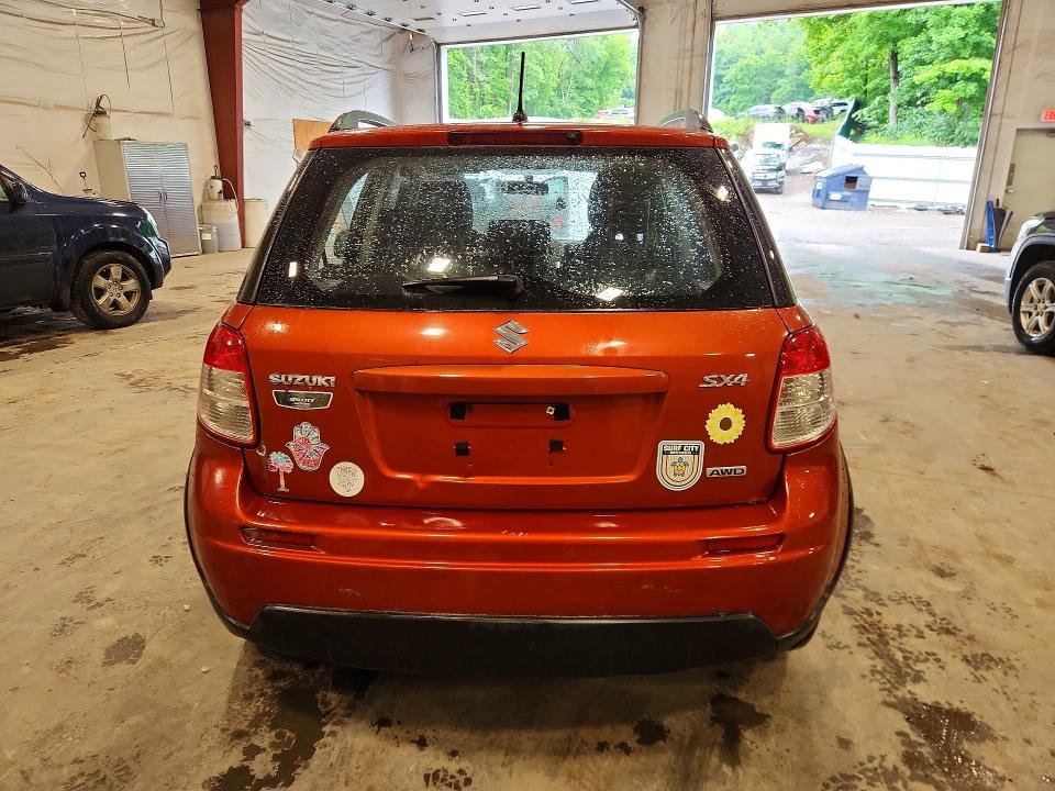 2010 Suzuki Sx4 VIN JS2YB5A33A6300218 COPART salvage auction — MINOR DENT/SCRATCHES, Nc - Parts Only-Record Of Sale, sold $250 on 2026-07-08 (photo 6)