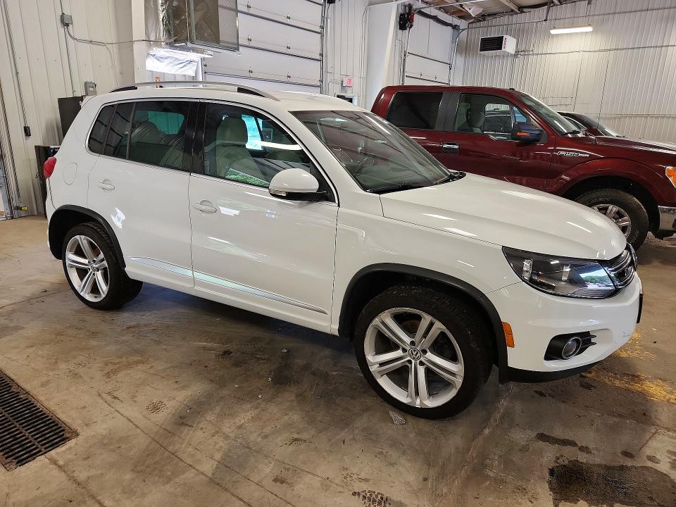 2016 Volkswagen Tiguan VIN WVGBV7AX7GW094119 COPART salvage auction — REAR END, Mn - Cert Of Title-Salvage, sold $4,000 on 2026-08-04 (photo 4)