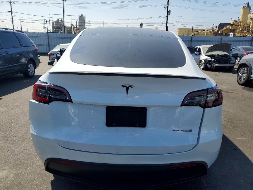 2023 Tesla Model y VIN 7SAYGDEF6PF662022 COPART salvage auction — FRONT END, Ca - Salvage Certificate, sold $7,200 on 2026-07-13 (photo 6)