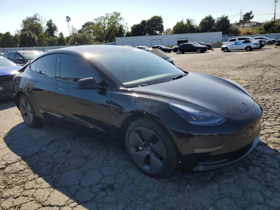 2023 Tesla Model 3 VIN 5YJ3E1EA4PF425772 COPART salvage auction — REAR END, Ca - Salvage Certificate, sold $6,500 on 2026-07-31 (photo 4)