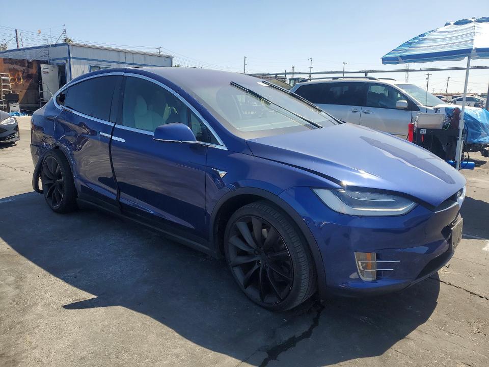 2021 Tesla Model x VIN 5YJXCBE24MF323339 COPART salvage auction — REAR END, Ca - Salvage Certificate, sold $14,400 on 2026-07-15 (photo 4)