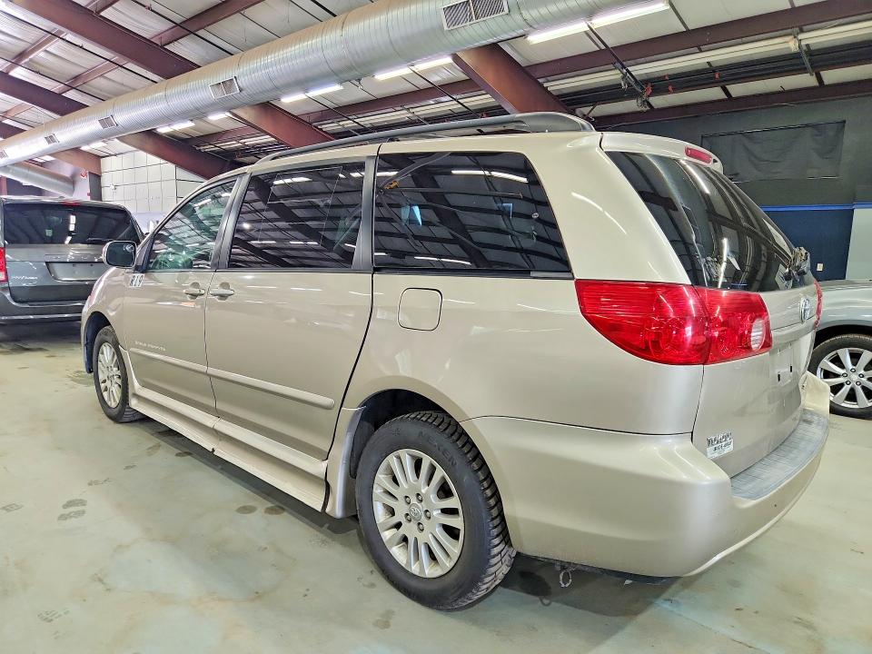 2007 Toyota Sienna VIN 5TDZK22C47S030467 COPART salvage auction — MINOR DENT/SCRATCHES, NH - CERT OF TITLE-REBUILT VEHICLE, sold $2,900 on 2026-07-27 (photo 2)
