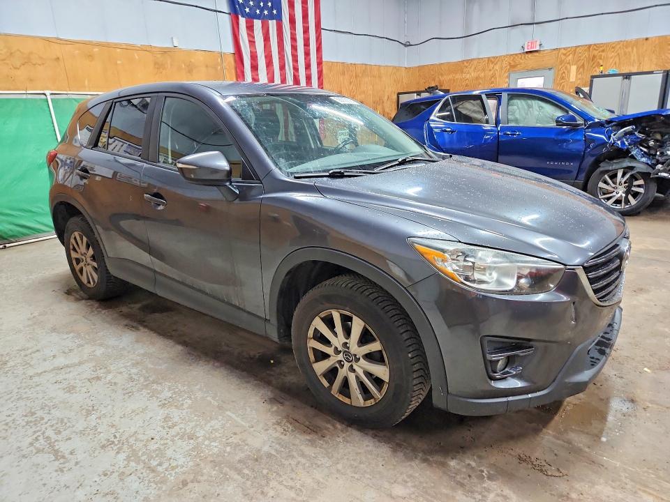 2016 Mazda Cx-5 VIN JM3KE4CYXG0797247 COPART salvage auction — SIDE, Mi - Certificate Of Title, sold $100 on 2026-07-29 (photo 4)