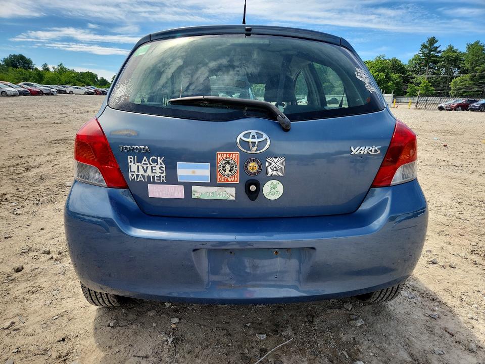 2011 Toyota Yaris VIN JTDKT4K30B5334954 COPART salvage auction — SIDE, Ma - Cert Of Title-Reconstrctd Coll, sold $825 on 2026-07-06 (photo 6)