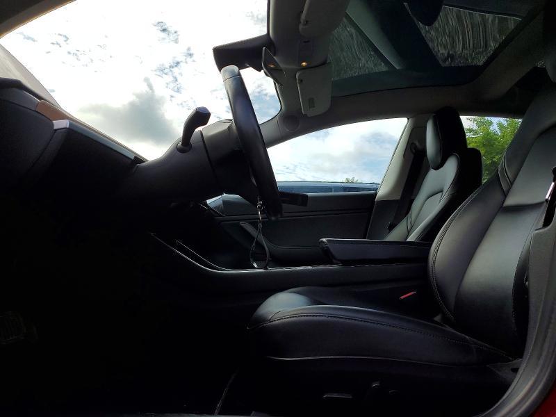 2018 Tesla Model 3 VIN 5YJ3E1EB1JF126997 COPART salvage auction — MINOR DENT/SCRATCHES, On - Permit Rebuilt - Unfit, sold $7,400 on 2026-07-03 (photo 7)