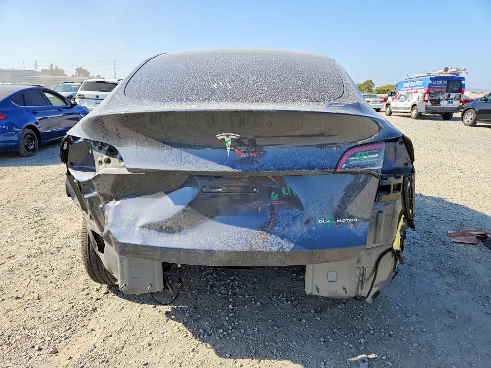 2023 Tesla Model y VIN 7SAYGDEE5PA027538 COPART salvage auction — REAR END, Ca - Salvage Certificate, sold $8,200 on 2026-07-02 (photo 6)