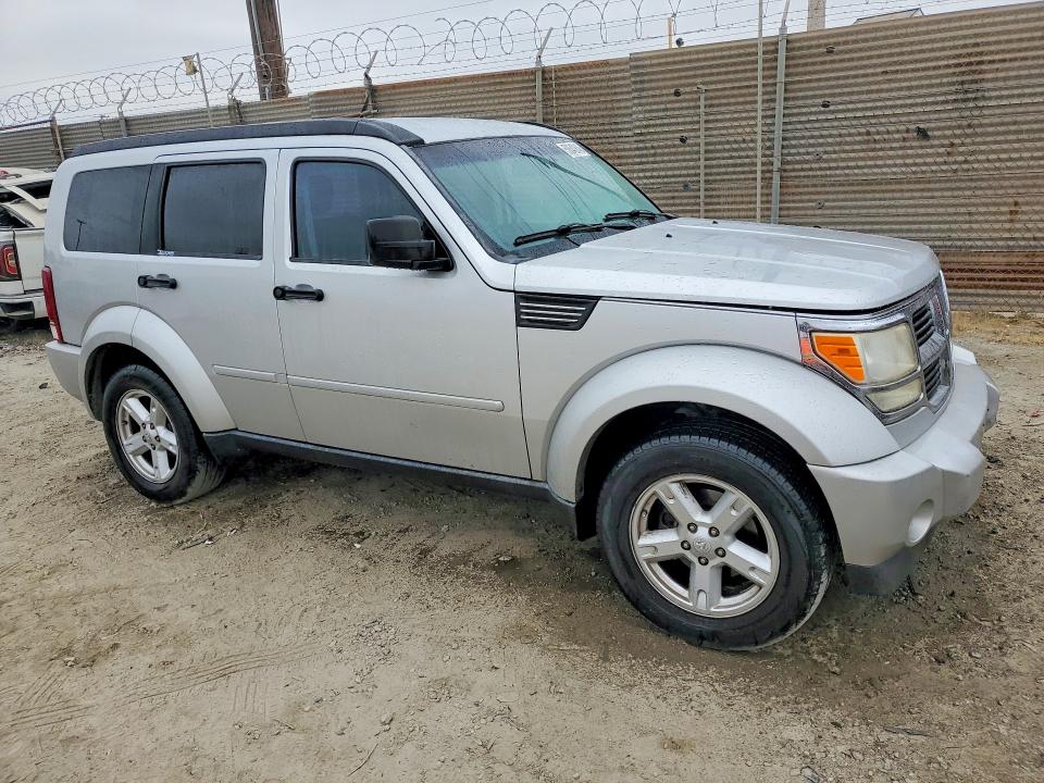 2007 Dodge Nitro VIN 1D8GU58K87W690529 COPART salvage auction — NORMAL WEAR, Ca - Dis/Dlr/Exp App For Dup Clean, sold $275 on 2026-07-02 (photo 4)