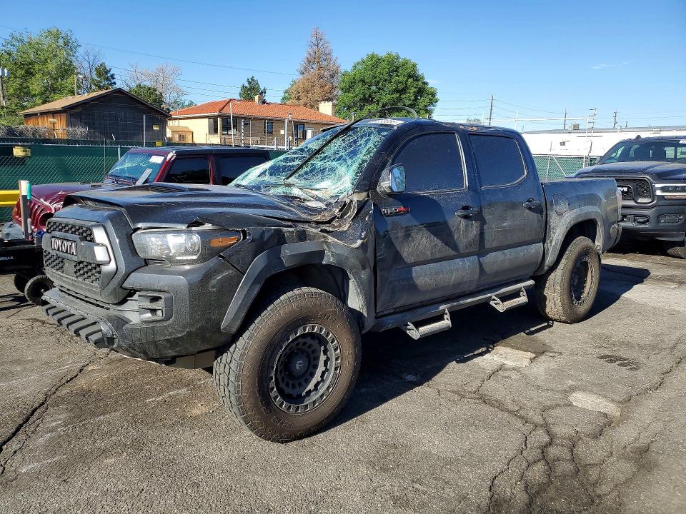 2019 Toyota Tacoma VIN 5TFCZ5AN7KX209708 COPART salvage auction — ROLLOVER, Co - Public - Salvage Title, sold $9,000 on 2026-07-09 (photo 1)