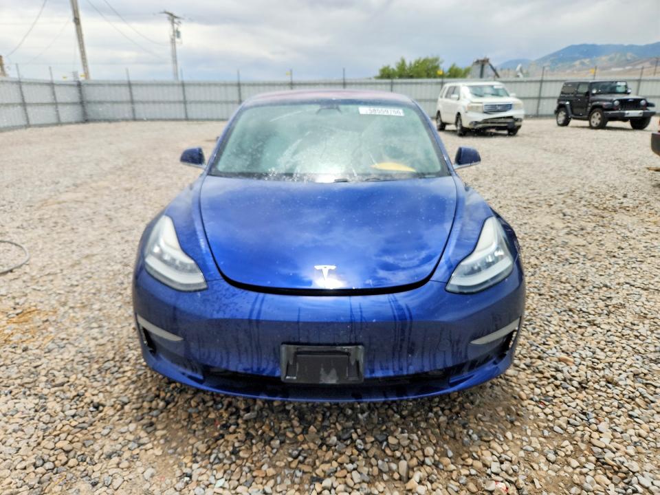 2018 Tesla Model 3 VIN 5YJ3E1EB6JF100928 COPART salvage auction — REAR END, UT - SALVAGE CERTIFICATE, sold $3,100 on 2026-07-31 (photo 5)