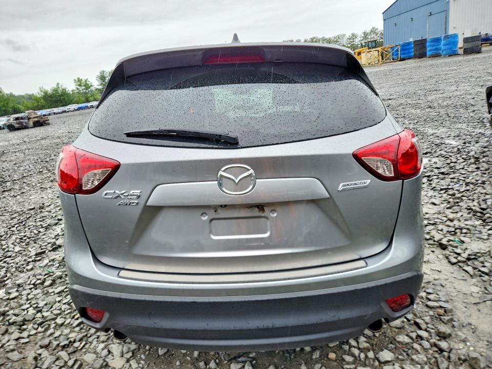 2015 Mazda Cx-5 VIN JM3KE4CY0F0477658 COPART salvage auction — ALL OVER, NJ - CERT OF TITLE-SALVAGE, sold $425 on 2026-07-29 (photo 6)