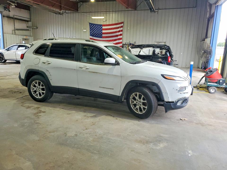 2014 Jeep Cherokee VIN 1C4PJMCB4EW183908 COPART salvage auction — NORMAL WEAR, NY - CERTIFICATE OF TITLE, sold $625 on 2026-07-06 (photo 4)