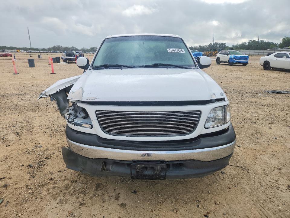 2001 Ford F-150 lightning VIN 1FTRW07L71KB10314 COPART salvage auction — FRONT END, Tx - Salvage Vehicle Title, sold $1,200 on 2026-07-02 (photo 5)