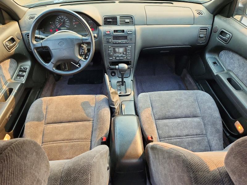 1998 Nissan Maxima VIN JN1CA21D0WT604844 COPART salvage auction — REAR END, AB - BOS - SALVAGE, sold $200 on 2026-07-16 (photo 8)